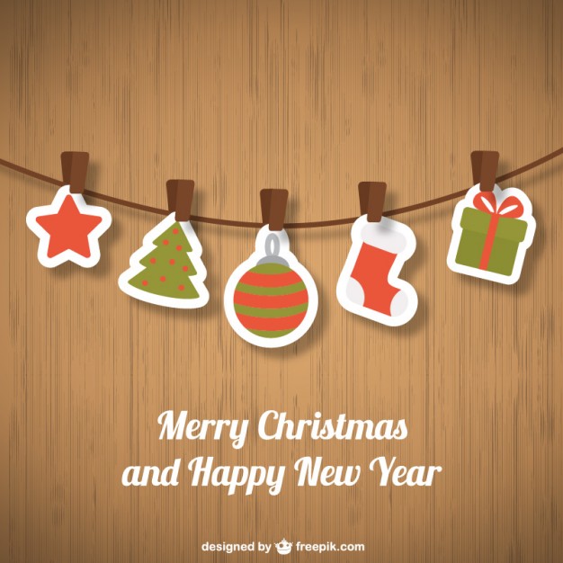 Christmas ornaments on wooden background  Vector |   Download